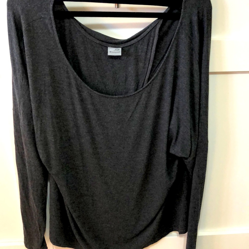 Champion shirt with two bands across the front of the shirt.